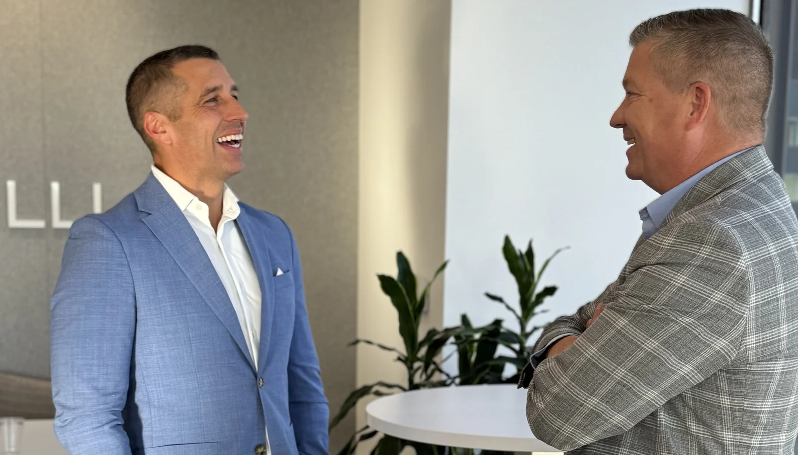 Richard C. Wilson with a guest at a Family Office Club event